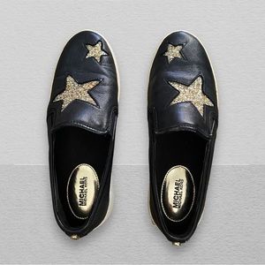 Michael Kors Black leather slip-on sneakers with gold glitter stars - Size 6M